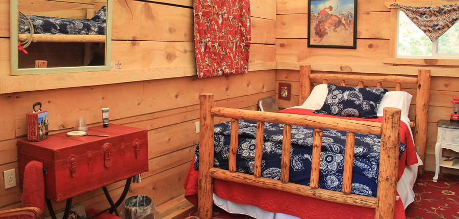 log bed in paradise, idaho glamping camp