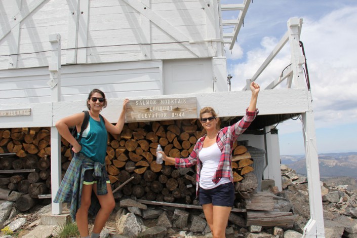 two women in front of salmon mountain lookout in idaho